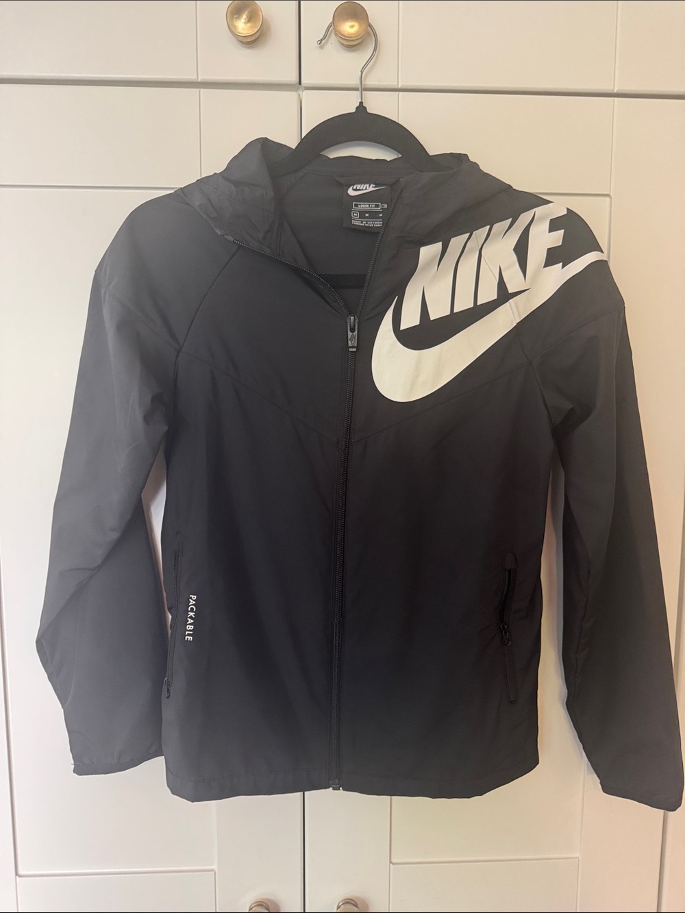 Nike Kids Black Hooded Packable Rain Jacket with White Logo